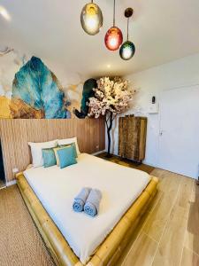 Appartements Le Nid d'Eliyah, suites avec jacuzzi 15min Disneyland Paris : photos des chambres