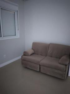 Amplo apartamento em Torres - 4 dormitórios