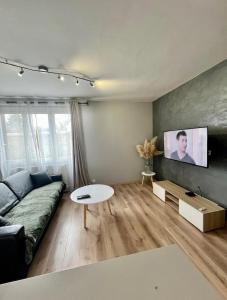 Appartements Charmant logement proche Paris - parking gratuit : photos des chambres