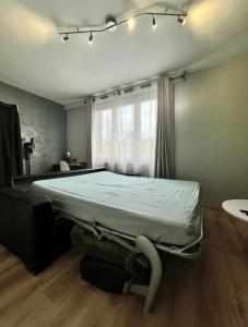 Appartements Charmant logement proche Paris - parking gratuit : photos des chambres