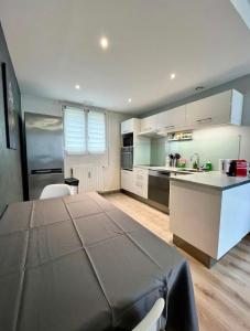 Appartements Charmant logement proche Paris - parking gratuit : photos des chambres