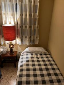 Cálida habitación con baño privado