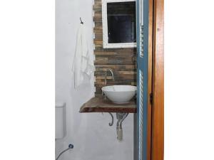 Entre a Mata Atlântida e o mar, quase pé na areia