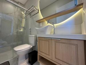 Apartamento Alto Padrão em Bombinhas à 70 metros da praia, com piscina aquecida, sala de jogos, academia e espaço kids!!