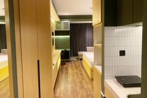 Scenic and Homey Studio Mataram City Apartment By Travelio