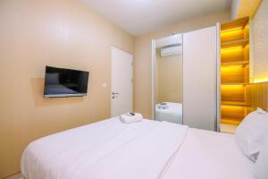 Well Designed 2BR Apartment at Springlake Summarecon Bekasi By Travelio