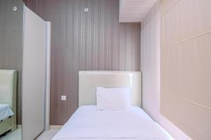 Well Designed 2BR Apartment at Springlake Summarecon Bekasi By Travelio