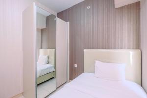 Well Designed 2BR Apartment at Springlake Summarecon Bekasi By Travelio
