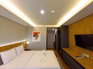 Cozy Studio Room at Mataram City Apartment By Travelio