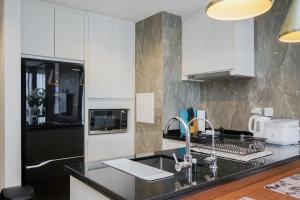 Stunning and Spacious 1BR at Branz BSD City Apartment By Travelio