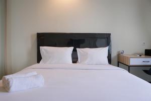 Comfortable and Strategic Studio Apartment Evenciio Margonda By Travelio