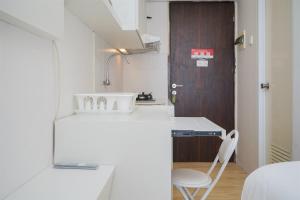 Cozy and Minimalist Studio at Serpong Greenview Apartment By Travelio