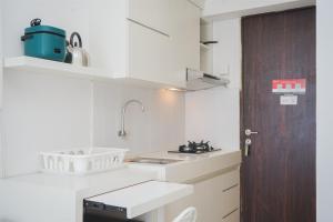Cozy and Minimalist Studio at Serpong Greenview Apartment By Travelio