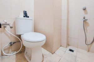 Cozy and Minimalist Studio at Serpong Greenview Apartment By Travelio