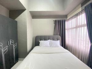 Relaxing 2BR Apartment at Newton Residence Bandung By Travelio