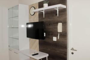 Comfy and Spacious 2BR at Springlake Summarecon Apartment Bekasi By Travelio