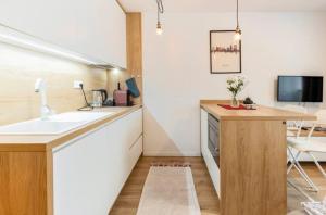 New condo with free parking in a garage