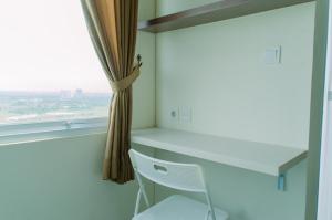 Minimalist and Cozy Living Studio Apartment at B Residence By Travelio