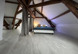 Appartements L armurerie - Appartement centre ville de Sens : photos des chambres
