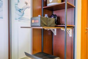 Restful and Tidy Studio at Evenciio Margonda Apartment By Travelio