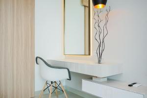 Cozy and Homey Studio at Bintaro Embarcadero Apartment By Travelio