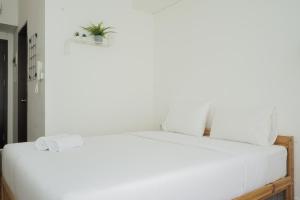 Comfort Studio at Casa De Parco Apartment By Travelio