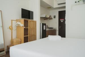 Comfort Studio at Casa De Parco Apartment By Travelio