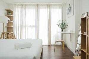 Comfort Studio at Casa De Parco Apartment By Travelio