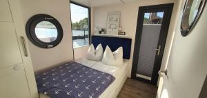 Hausboot Fjord Dory mit Biosauna in Schleswig