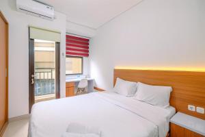 Well Furnished Studio at Transpark Cibubur Apartment By Travelio