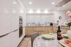 Dolmen Court Qawra fl13 w shared pool! by Homely