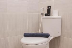 Minimalist and Cozy Studio at Vasanta Innopark Apartment By Travelio