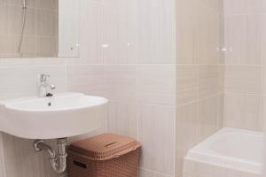 Minimalist and Cozy Studio at Vasanta Innopark Apartment By Travelio