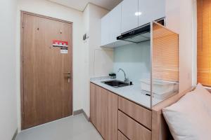 Comfort and Cozy Studio Apartment at B Residence By Travelio