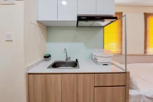 Comfort and Cozy Studio Apartment at B Residence By Travelio