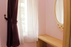 Warm and Homey 2BR at Springlake Summarecon Bekasi Apartment By Travelio