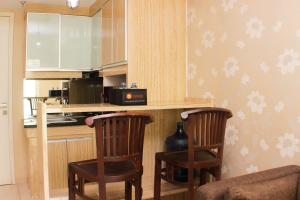 Warm and Homey 2BR at Springlake Summarecon Bekasi Apartment By Travelio