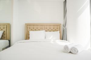 Stunning and Strategic 2BR Gold Coast Apartment near PIK By Travelio