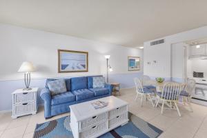 Relaxing inland condo with pool and steps to beach