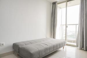 Stunning and Strategic 2BR Gold Coast Apartment near PIK By Travelio