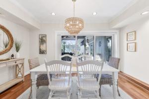 Unique waterfront home in Olde Marco with pooldeck