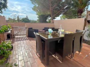 Appartements Appart RDC - 4pers - Clim - Piscine : photos des chambres