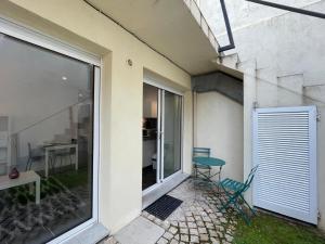 Appartements Confort & gare - Exterieur - Parking : photos des chambres