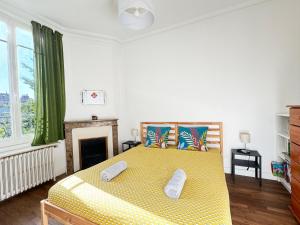 Maisons de vacances La Violette - agreable maison jardin RER B - Metro 4 : photos des chambres