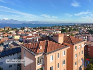 Window of Lake Family Apartment with Parking Spot DesenzanoLoft Official Partner Homes & Villas by Marriott Bonvoy