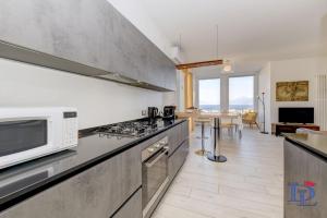 Window of Lake Family Apartment with Parking Spot DesenzanoLoft Official Partner Homes & Villas by Marriott Bonvoy