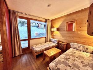 Studio divisible pour 4 personnes, centre station, casier à skis - FR-1-353-25