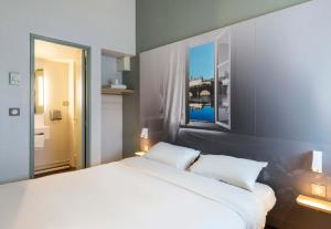 Hotels B&B HOTEL Laval Change : photos des chambres