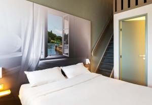 Hotels B&B HOTEL Laval Change : photos des chambres