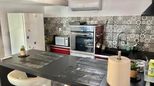 Chez BEN avec tout le confort clim wifi Netflix gratuit